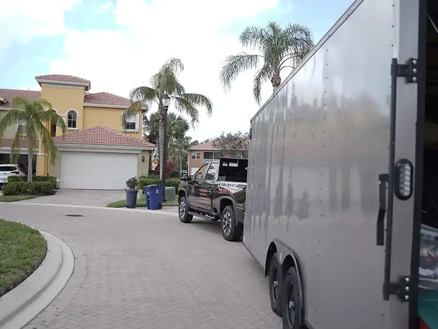 Hands On Deck moving trailer positioned in a Southwest Florida residential community