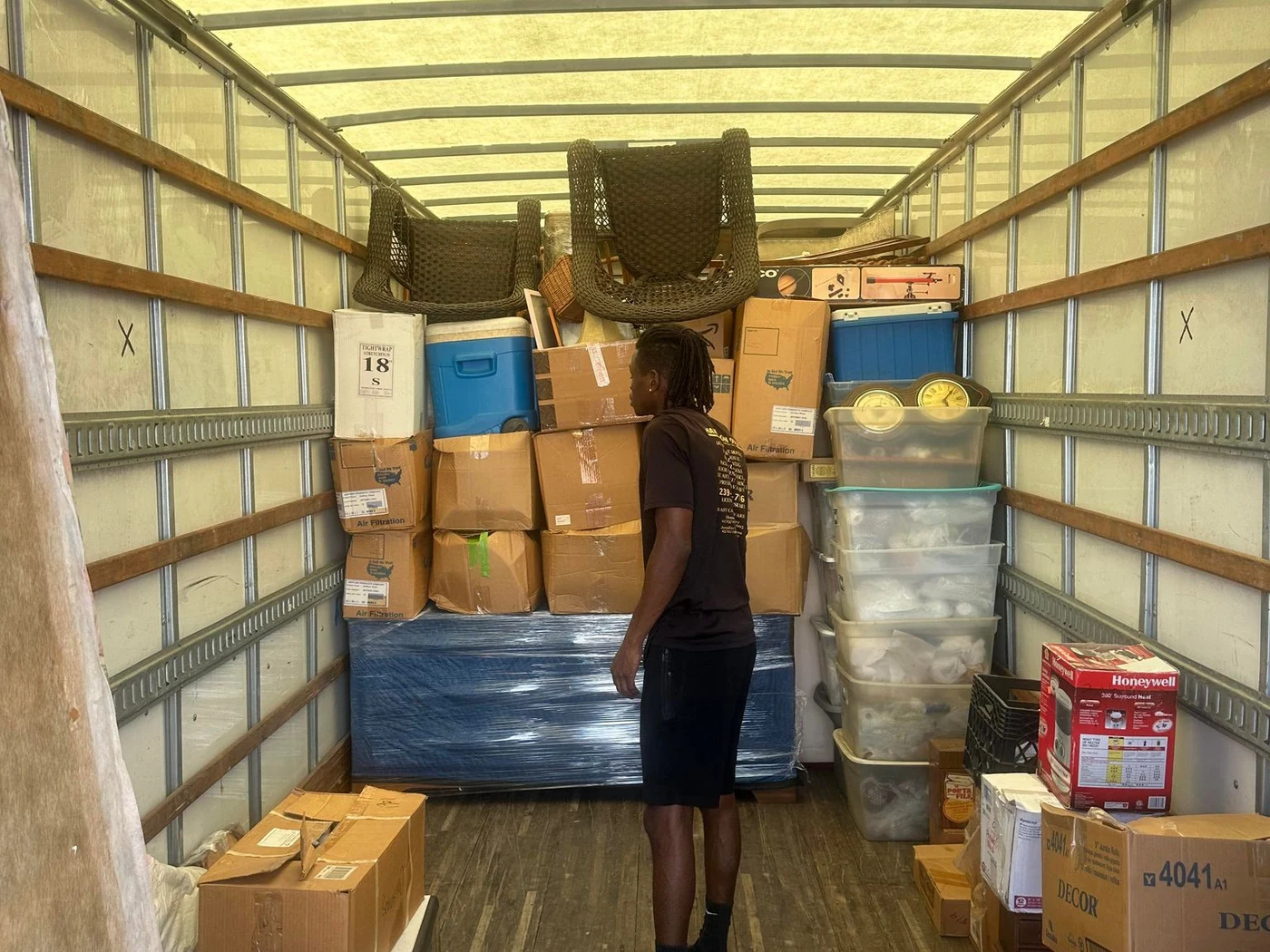 Hands On Deck mover organizing a loaded moving truck