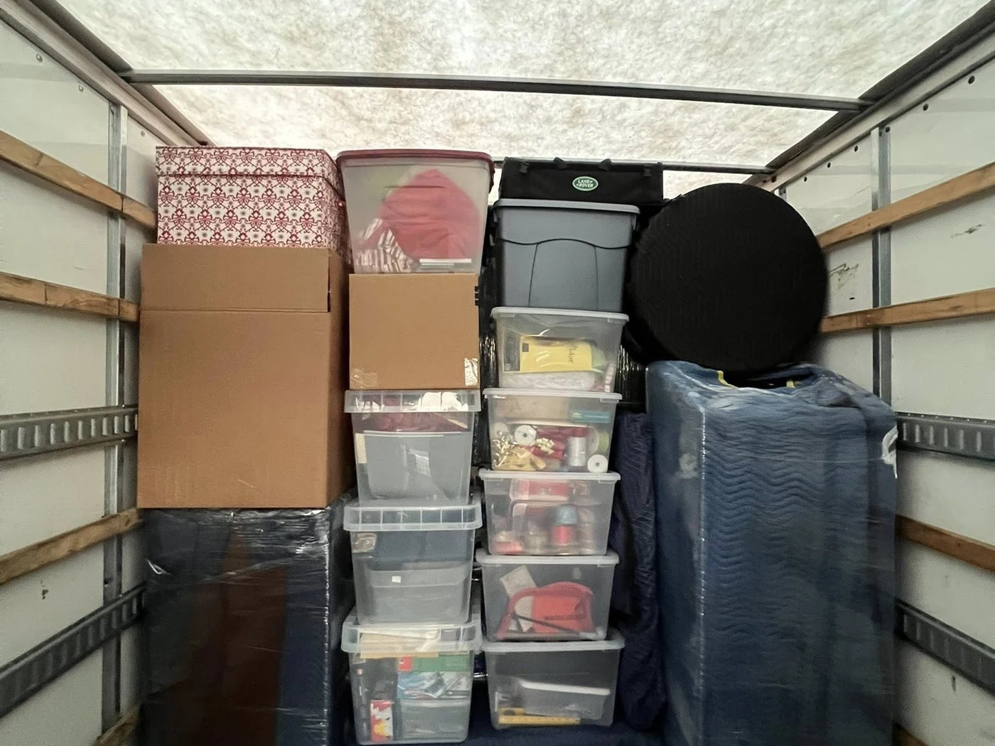 Organized household contents loaded inside a moving truck