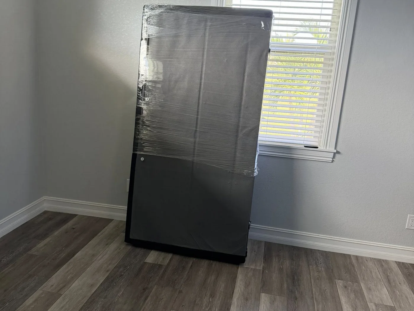 Tall equipment wrapped for safe transportation