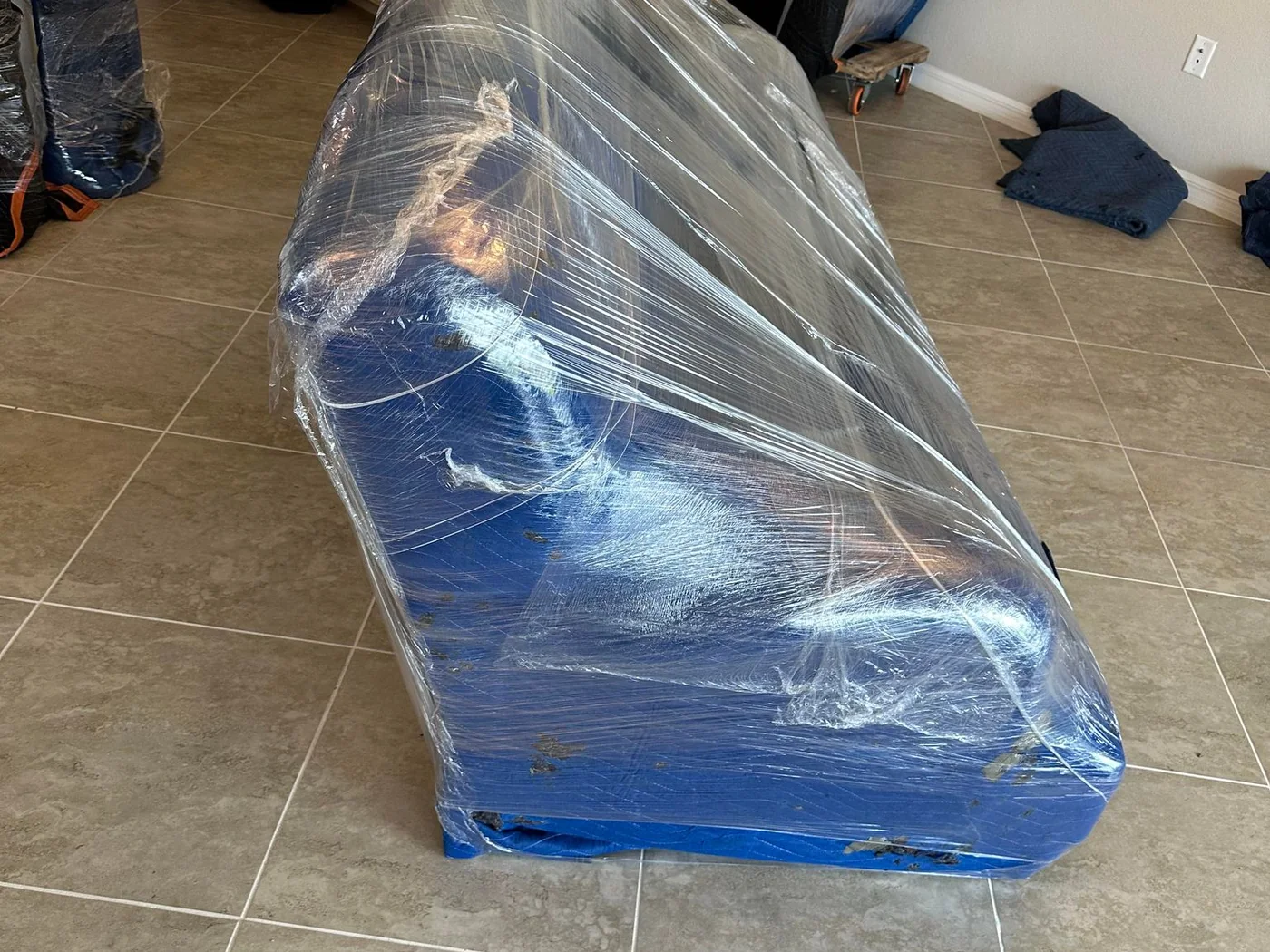 Large business item wrapped for moving protection