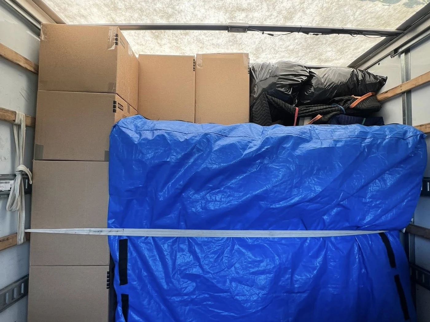 Household items protected and secured inside a moving truck