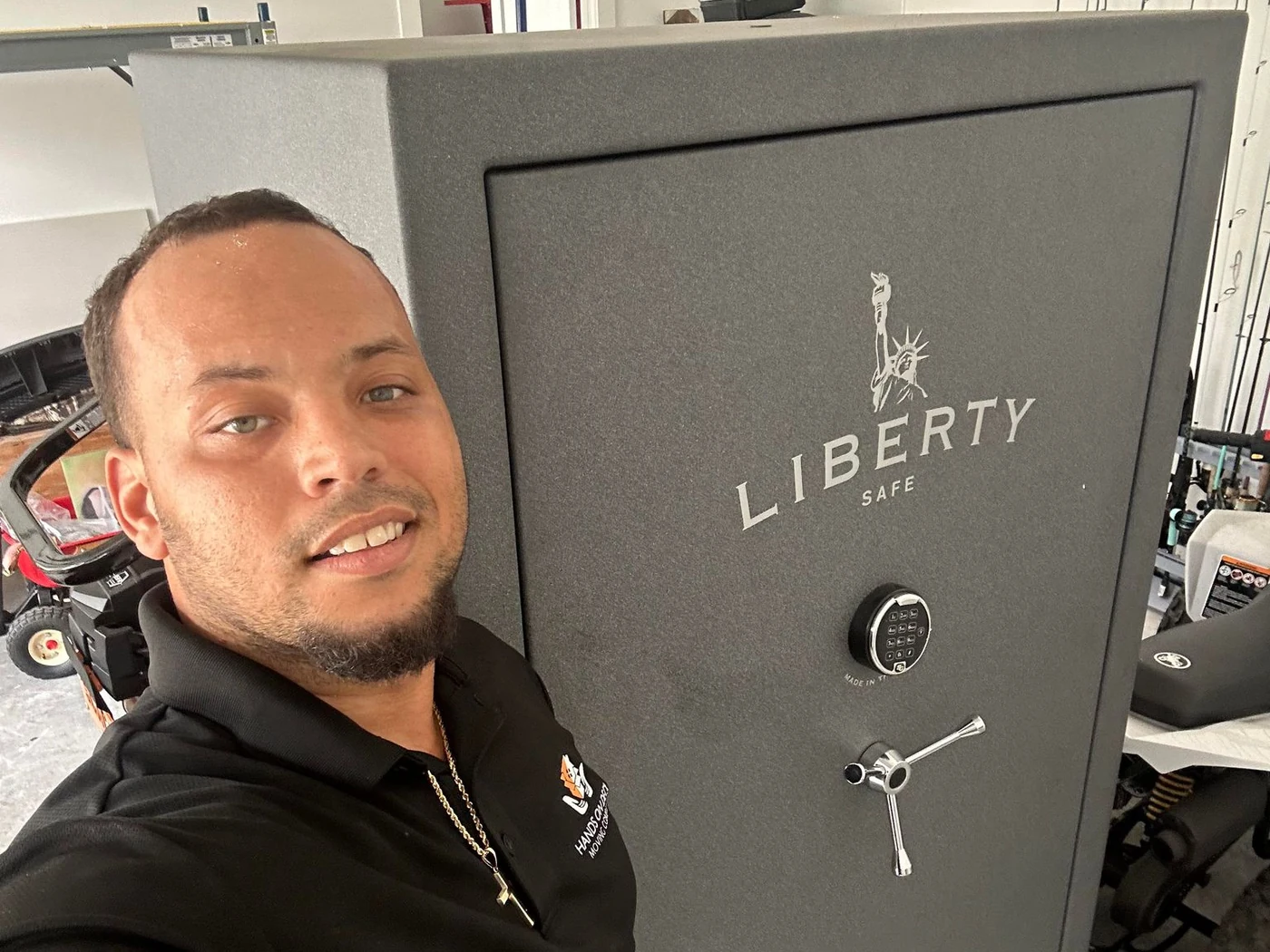 Hands On Deck mover beside a large safe prepared for specialty handling