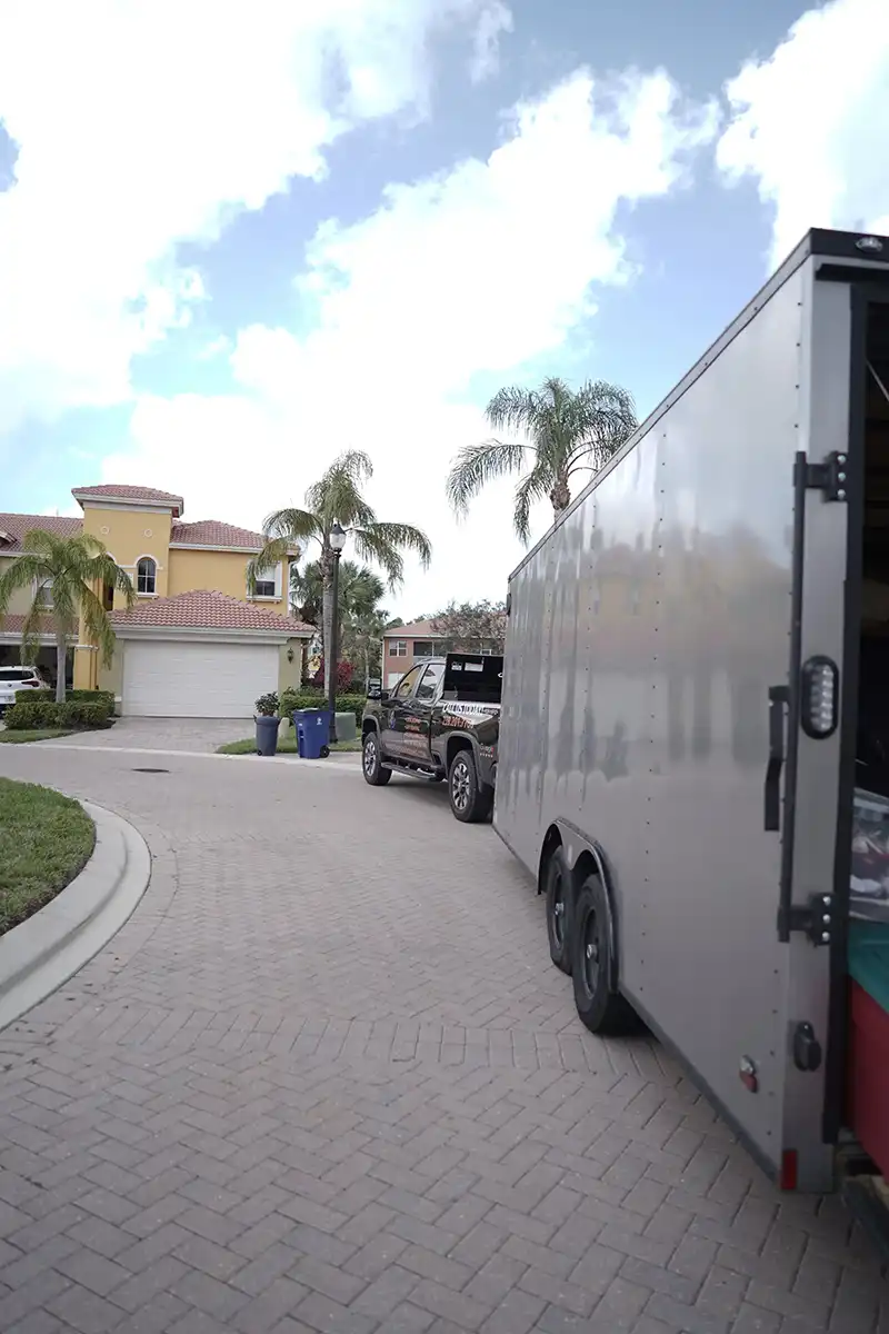 Moving trailer positioned in a residential Southwest Florida neighborhood