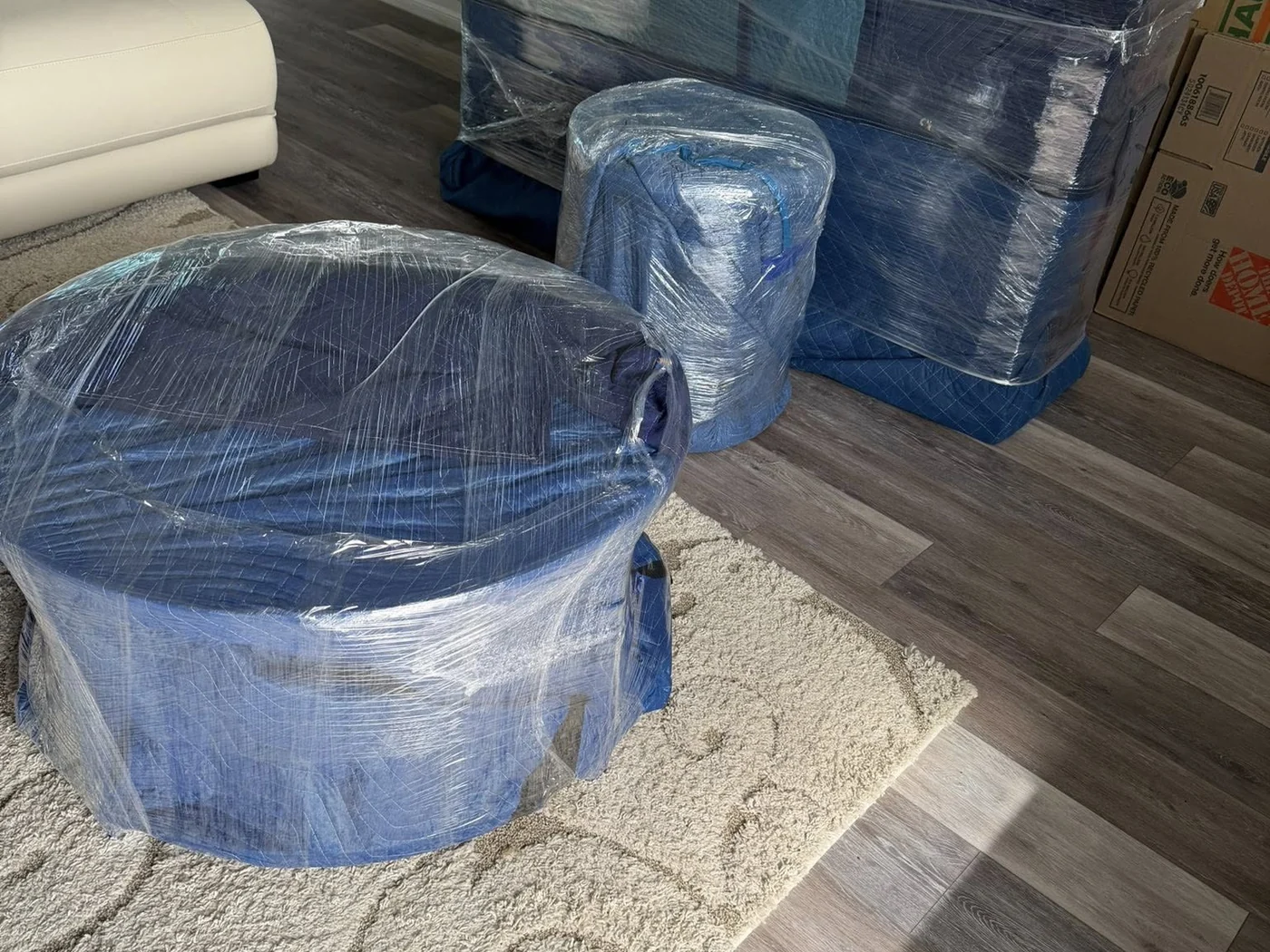Wrapped household furniture prepared for moving