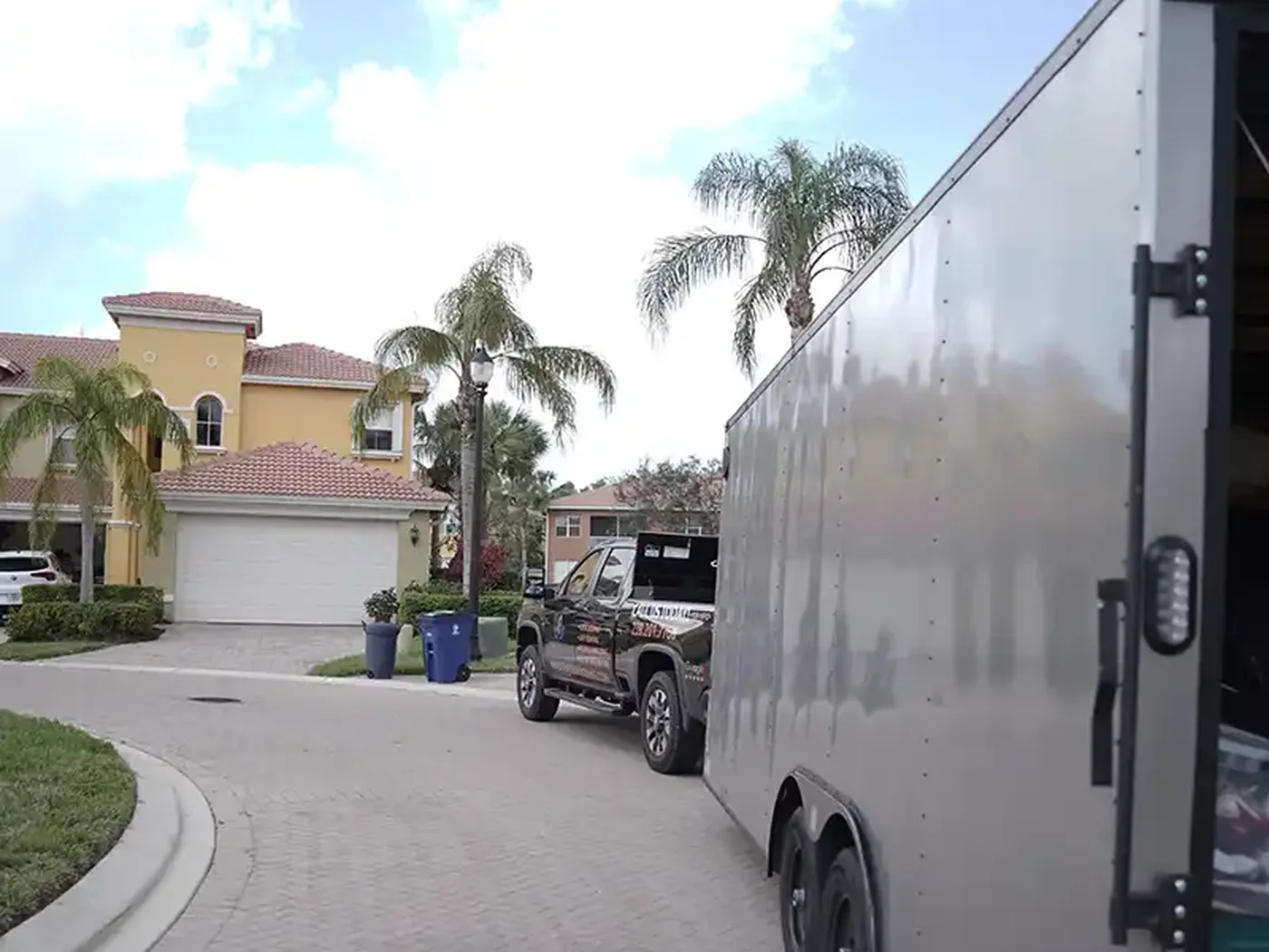Moving trailer staged in a Southwest Florida residential neighborhood