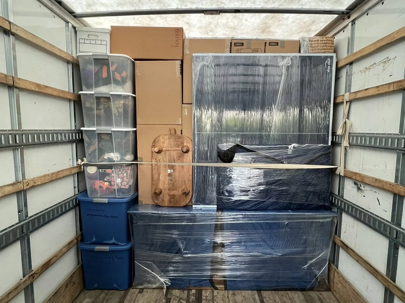 Organized household moving load inside a truck