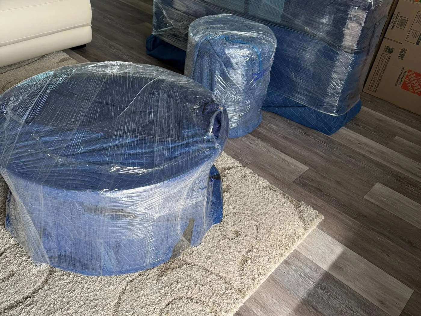 Protected furniture prepared inside a home before moving