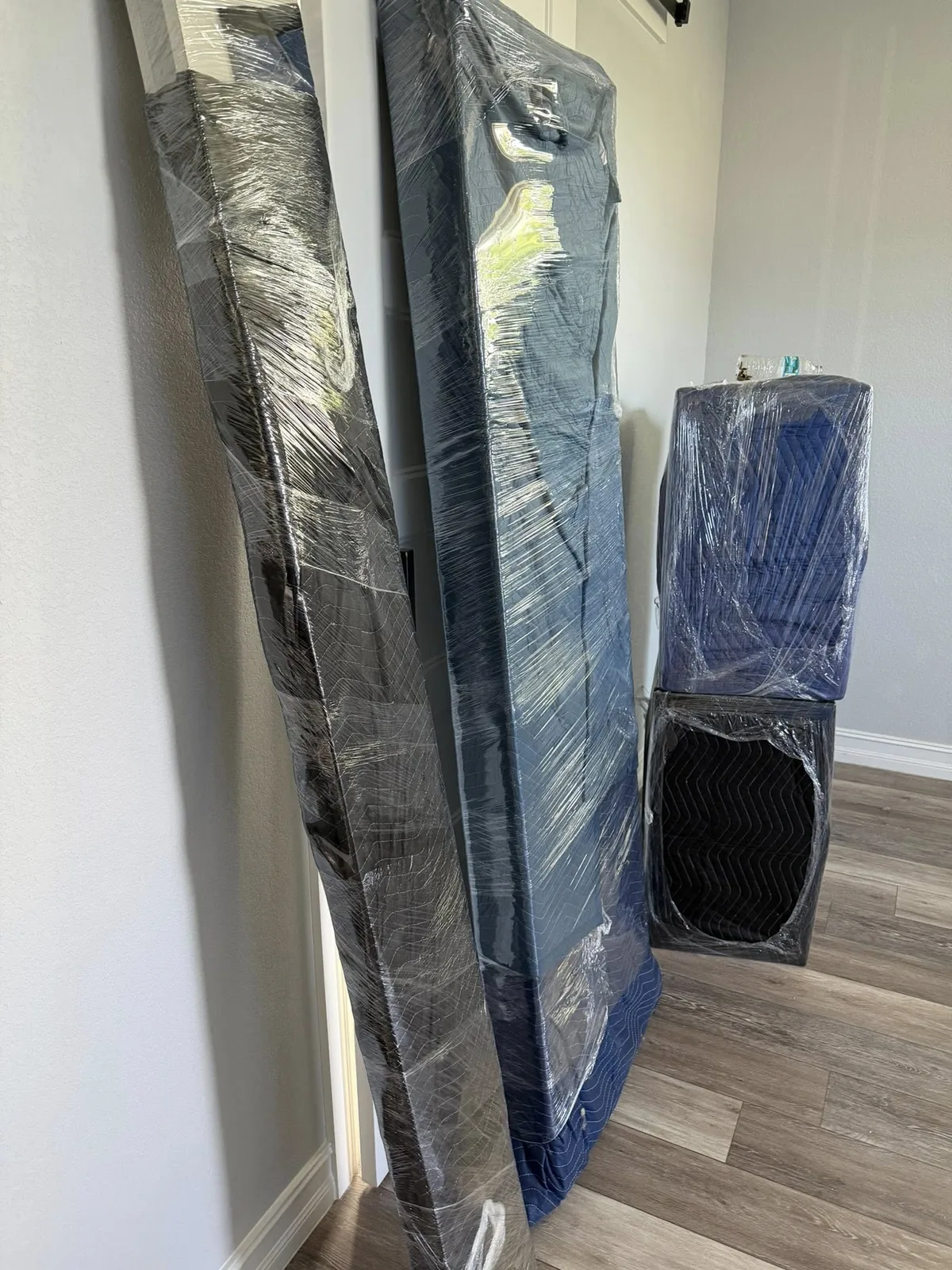 Wrapped furniture prepared for a move